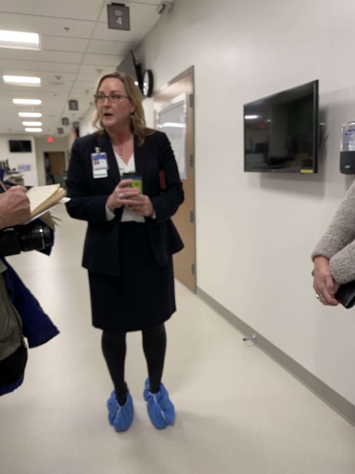 Dr. Lesley Ogden, MD., CEO., gives a tour to media representatives.jpg